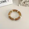 Pulsera de Cuerda Elástica con Empalme de Metal y Resina de Venta Caliente Transfronteriza para Mujer Accesorios de Joyería para Manos con Diseño de Pulsera Versátil Manchada Europea y Americana