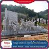 Figura de escultura em pedra mural em relevo parede traseira com sombra parede de tela do pátio parede da entrada da villa escultura em pedra azul quadrada parede de tela