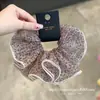 Selección PremiumElásticos elegantes y con estilo, nueva colección de accesorios para el cabello de nicho de alta gama para recoger el cabello en la parte posterior de la cabeza
