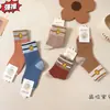 Calcetines de algodón gruesos de punto para bebé, otoño e invierno, altos, holgados, a rayas, con letras de dibujos animados, calcetines para niños, venta al por mayor, envío completo