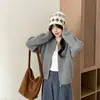 Abrigo suéter casual versátil de nuevo estilo transfronterizo para otoño e invierno, color liso, doble cremallera, cárdigan de punto gofrado para mujer