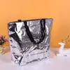 Bolsa tejida portátil logo impreso personalizado bolsa grande llamativa bolsa impermeable piel de serpiente láser bolsa promocional de exposición personalizada