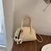 Bolsa de Mão de Design de Nicho Transfronteiriço para Mulheres Verão 2026 Nova Versátil Retro de Bolinhas Ombro Transversal