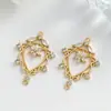 Colgantes de Flor Hueca Chapados en Oro Cobre Accesorios para Joyería DIY Accesorios para Pulseras de Cuentas Collares Materiales Venta al por Mayor