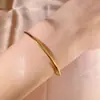 Pulseira Empilhável de Ouro 18K Anel Liso Transfronteiriça, Luxo Acessível Pulseira de Aço Titânio Brilhante Feminina de Nicho, Versátil e Não Desbota