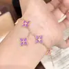 Pulsera de Flor de Cuatro Hojas Morada Estilo Xiaohongshu Exquisita Nicho Versátil Accesorio Joyería para Mano Femenina Gama Alta Lujo Ligero