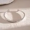 Pulsera geométrica abierta en forma de C metálica lisa europea y americana, pulsera personalizada de nicho ins transfronteriza, joyería de alta gama a la moda