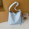 Bolsa tote de moda artística estilo coreano para mulheres, novo modelo de primavera 2026, bolsa de ombro e transversal de grande capacidade para o dia a dia