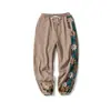Otoño e invierno 2024 nuevo pantalón de algodón chino para hombre de comercio exterior moda vintage talla grande bordado pantalón deportivo