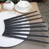Palillos de aleación al por mayor de fábrica puntiagudos esmerilados palillos de sushi palillos especiales para hotel palillos hexagonales de aleación japoneses y coreanos