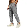 Pantalones versátiles de algodón y lino para hombre, nuevos, transfronterizos europeos y americanos, cintura elástica, corte holgado, color liso, transpirables, con puño