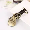 Estilo Criativo Fofo Bronze Antigo Desenho Animado Gato Gordo Decoração de Anel Pingente de Bolsa Couro Trançado Artesanal Chaveiro de Carro