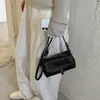 Bolso de mano pequeño vintage de alta gama para mujer, nuevo modelo 2026, bolso de hombro exquisito y versátil de nicho, bolso cruzado para el trabajo