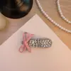 Pinza para el pelo de lazo de estilo coreano con diamantes completos para mujer, nuevo diseño de alta gama, elegante pinza de pico de pato lateral para flequillo