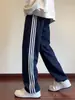 Conjunto deportivo de moda para primavera y otoño para hombres y mujeres, con diseño de tres rayas, ropa atlética casual, conjunto de running transfronterizo, cárdigan y pantalones largos, un conjunto de dos piezas