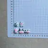 Nueva serie de vacas brillantes de dibujos animados clip para flequillo de pegamento de crema hecho a mano DIY llavero accesorios para zapatos
