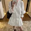 Em estoque 2026 Estilo Coreano Outono Nova Chegada Elegante Renda Vazada Manga Longa Cintura Marcada Algodão Puro Branco Vestido Curto