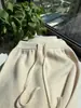 Calça de malha de lã espessa de perna reta para mulheres, nova coleção outono/inverno 2026, corte afina a silhueta, cintura elástica, tecido macio e fluido, estilo wide leg, moderna