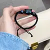 Livrinho Vermelho mesmo estilo pulseira de gatinho preto fofo homens e mulheres casal corda trançada design de nicho presente para namoradas