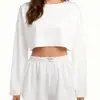 Conjunto de pijama casual feminino transfronteiriço com design vazado, moderno, simples, de corte solto, com blusa de manga longa e shorts