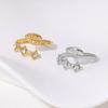 Anillo de acero de titanio con incrustaciones de diamantes, estilo europeo y americano, con un temperamento fresco y pequeño, simple y combinable, chapado en oro de 18 quilates para mujer.