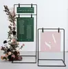 Nuevos accesorios para bodas: expositores cuadrados de hierro forjado, letreros, marcos de hierro, floreros para el área de bienvenida y elementos de fondo decorativos