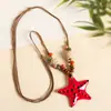 Collar con colgante de campana de mariposa de cerámica de estilo étnico retro para mujer, diseño nuevo y moderno, cadena larga para suéter, accesorios