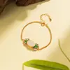 Novo Estilo Chinês Antigo Banhado a Ouro Alto Padrão Palaciano Flor de Lótus Flor de Esmalte Pulseira Design de Luxo Leve Joia de Mão