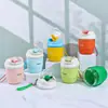 Nuevo vaso de agua color macarrón con asa portátil, vaso de vidrio, a prueba de fugas, alto valor estético, elegante vaso con pajilla