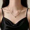 Collar de Acero Titanio con Cadena de Cuentas de Arroz en Forma de Corazón Metálico para Mujer, Diseño de Nicho Simple y Elegante, Collar Versátil de Clavícula de Alta Gama para el Día a Día