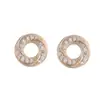 Pendientes de aro pequeño de metal transfronterizos diseño espiral cóncavo-convexo personalizado joyería de aguja de plata 925 pendientes de nicho para mujer