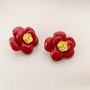 Moda europea y americana nueva estilo pequeño fragante forma de camelia esmalte vidriado gota de aceite temperamento aretes de aguja de plata 925 para mujer Venta al por mayor
