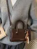 Bolso de Mano de Nicho Tendencia Estilo Coreano para Mujer 2026 Nuevo Modelo Bolso Cruzado de Lujo Ligero Bolso de Hombro de Nicho Retro de Moda Tendencia