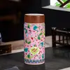 Fabricantes de origen de taza térmica de cerámica Jingdezhen taza térmica de porcelana azul y blanca taza de regalo para la salud taza de burbujas logotipo
