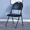 Silla plegable con respaldo, adecuada para exportación, ferias comerciales, uso en oficina portátil, entornos de conferencia y como silla de computadora; cuenta con un respaldo engrosado