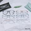 Armazón de gafas de titanio puro 6g al por mayor redondo TR90 tamaño pequeño armazón de gafas con chapado IP armazón de titanio transparente libro rojo pequeño 9882