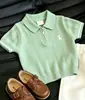 Estilo Coreano Camisa de Punto para Niños Verano 2026 Nueva Verde Bordado Hueco Cuello Polo Manga Corta Pantalones Casuales para Niños Modernos