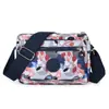 Bolso cruzado transfronterizo para mujer, bolso de hombro de nailon a la moda, nuevo bolso para mamá de gran capacidad multicapa, bolso cuadrado pequeño casual y elegante