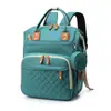 Bolsa de mamá para biberón más vendida transfronteriza, mochila portátil de gran capacidad para maternidad y bebé con diseño bordado, chupete y características resistentes al agua