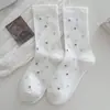 Calcetines florales de longitud media para mujer, otoño e invierno, estilo ins francés suave, calcetines holgados versátiles, calcetines largos de algodón estilo universitario