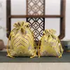 Bolsa de brocado estilo chino bordado texto juego bolsa de franela biselada con cordón bolsa de la suerte almacenamiento de joyas bolsa pequeña