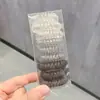 Set de 9 Piezas de Cuerda de Teléfono para Recoger el Cabello en Caja, Nueva Cuerda de Cabello Simple de Alta Elasticidad Banda de Goma Estuche de Cuero