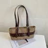 Bolso de Axila Versátil Estilo Motociclista Coreano de Nicho para Mujer Otoño/Invierno Hebilla de Cuero Retro Bolso de Hombro Único Casual Simple