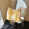 Bolso Pequeño Cruzado con Lazo para Mujer 2026 Nueva Moda Bolso de Paja para Viajar Bolso Cubo Verano Versátil Bolso de Hombro