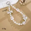 Nuevo colgante de manzana y mariposa con cuentas hecho a mano para teléfono, con un toque de alta gama, charm de cadena doble para bolso, cadena para colgar el teléfono, regalo