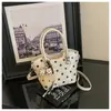 Bolso Cubo de Lunares 2026 Nuevo Estilo Coreano Estilo Ins Bolso de Hombro Cruzado Único Bolso de Mano Versátil para el Trabajo Cuero Suave Nicho