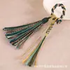 Hebilla de Anillo Estilo Xizang Hecha a Mano con Hilo de Algodón Retorcido a Mano, Borlas de Colores, Llavero de Estilo Étnico, Colgante para Bolso