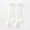 Calcetines Lolita Blancos de Encaje hasta la Pantorrilla Calcetines Jk para Mujer de Longitud Media a la Pantorrilla Calcetines de Algodón con Lazo de Encaje Media Pierna Lolita