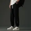 Bolsa de cintura cruzada Amazon Explosions Cintura Rota Borde Rasgado Amoníaco Elástico en Cuatro Lados Seda Helada Pantalones de Nueve Puntos Estilo Hong Kong para Hombre Sueltos Elásticos