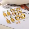 Brincos Quadrados de Aço Inoxidável com Face de Marca Tendência Retrô Europeus e Americanos Brincos de Laço Brincos Femininos